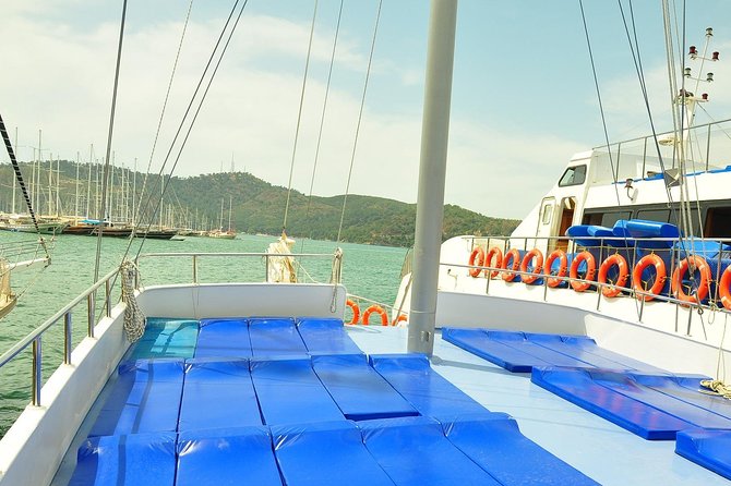 12 Island Boat Trip from Fethiye - Flat Island: swimming over sightseeing