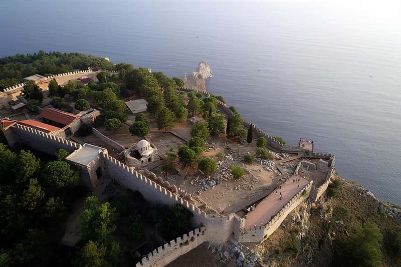 Alanya: Castle Tour with Damlatas Cave & Cable Car Options - Alanya Castle, walls above the harbor