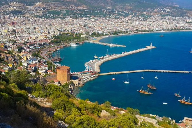 Alanya Catamaran Boat Tour with Sunbathing Swimming & Snorkelling - Leaving Alanya harbor by catamaran
