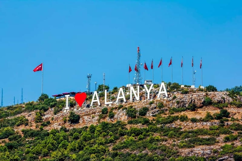 Alanya City Highlights & Sunset Beach BBQ Party - Harbor views, the Red Tower, and the old shipyard