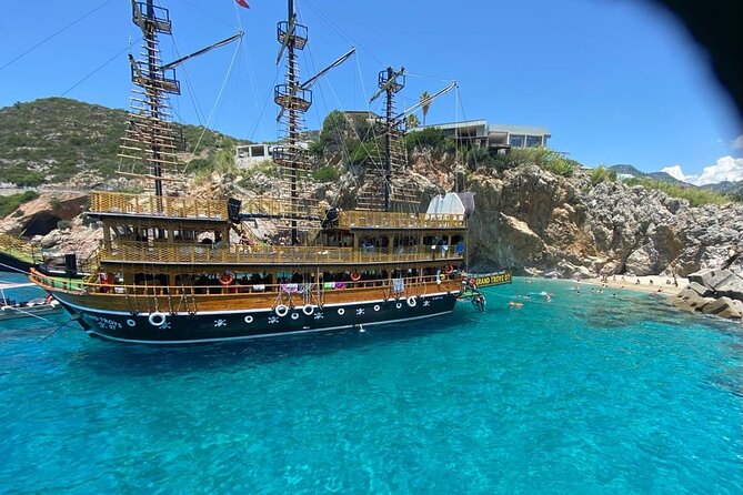 Alanya Grand Pirate Boat Tour with Lunch, Soft Drinks & Transfer - Caves, Cliffs, and Swimming Stops