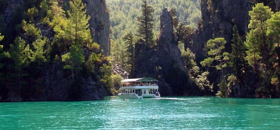 Alanya: Green Canyon Boat Trip with Lunch and Hotel Pickup - Boarding the boat at Green Canyon