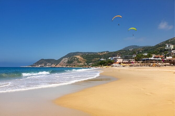 Alanya Paragliding Experience By Local Expert Pilots W/ Transfer - Landing and the Optional Photo Package