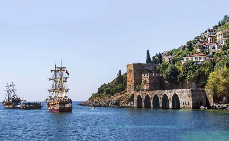 Alanya: Pirate Boat Trip with Meal, Drinks and Pickup Option - Leaving the Harbor on a Pirate-Style Boat