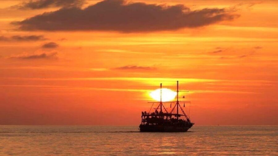 Alanya: Sunset Cruise with Dinner - Red Tower, shipyard, and Cleopatra Beach