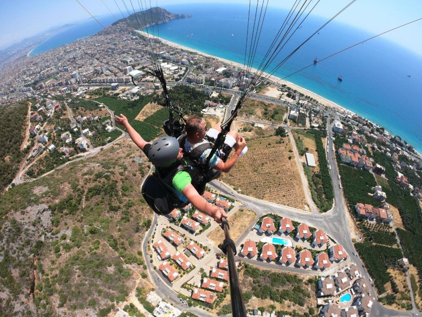 Alanya: Tandem Paragliding from 700m with Meeting or Pick Up - Take-off, open-air views, and the 12-minute flight