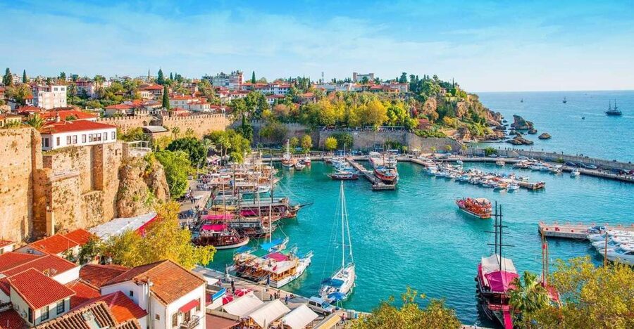 Antalya: Guided Old Town Tour with Boat Trip and Lunch - Walking through Kaleiçi Old Town