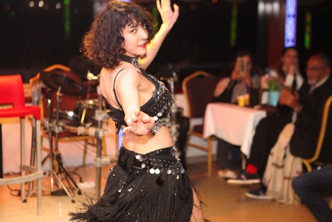 Bosphorus Dinner Cruise Tour With Turkish Night Show - Crossing beneath the Bosphorus Bridge
