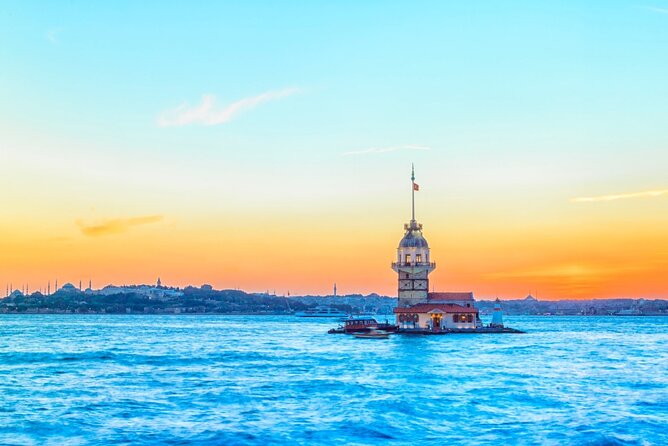 Bosphorus Evening Cruise: Dinner, Live Shows & Private Table - Ortaköy Mosque beneath the bridge