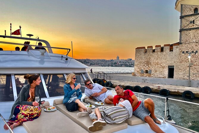 Bosphorus Sunset Yacht Cruise with Snacks and Live Guide - The first sights: Bosphorus Bridge and Maiden’s Tower