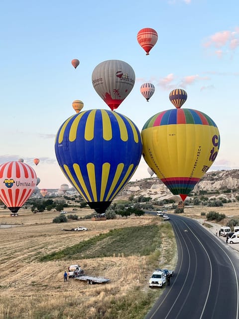 Cappadocia: Goreme Hot Air Balloon Flight Experience - Landing, flight paper, and champagne toast
