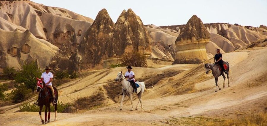 Cappadocia: Horse Riding Tour Sunset or Day Time with Pickup - Riding into Sword Valley from the upper trail