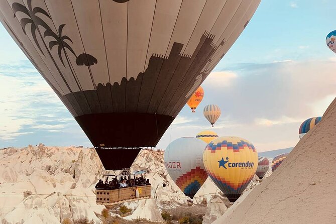 Cappadocia Hot Air Balloon Flight Over Fairy Chimneys And Goreme - Landing on a trailer and celebrating afterward