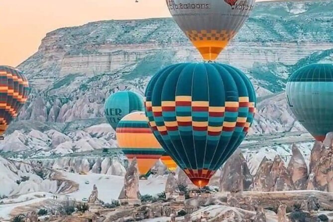 Cappadocia Hot Air Balloon with Pickup, Breakfast & Champagne - One hour above Cappadocia’s fairy chimneys
