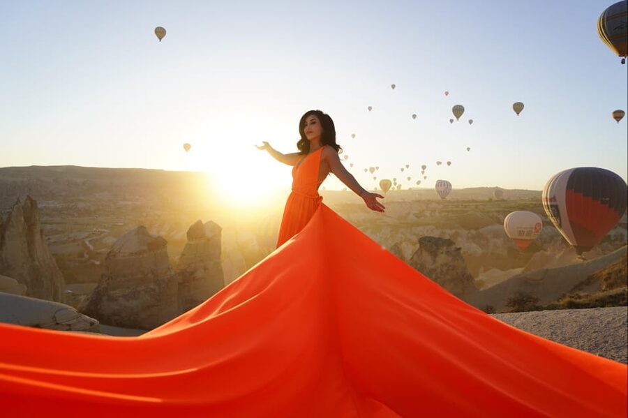 Cappadocia: Private Outdoor Photoshoot at Sunrise w/Transfer - Choosing and wearing the complimentary dress