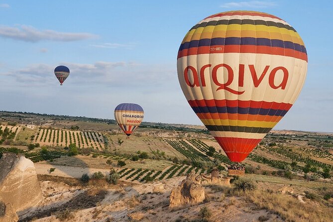 Cappadocia Sunrise Hot Air Balloon Ride | All-Inclusive Tour Cat - Watching the balloon come to life at Çat Vadisi