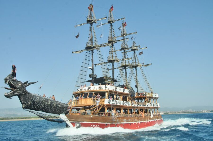 City of Side: Dolphin Island Boat Tour with BBQ & Foam Party - The first swim stop and live music