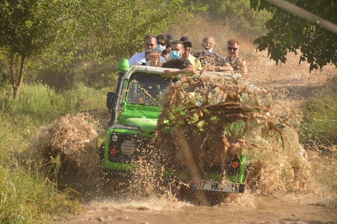 Discover the Taurus Mountains with Antalya Jeep Safari Tour - Water fights, bottles, and muddy clothes