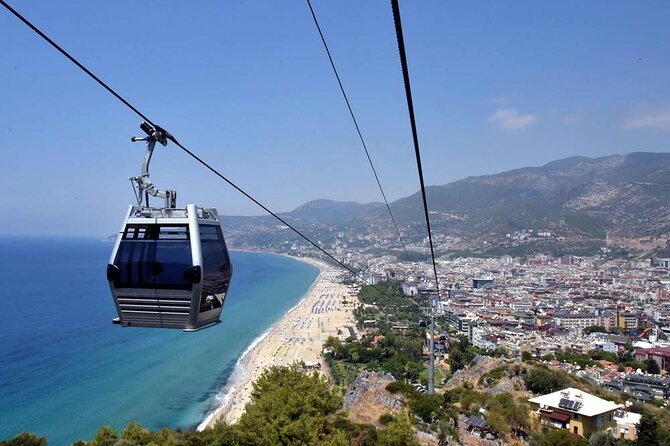 From Alanya: Sightseeing Half Day City Tour w/Cable Car - Hotel pickup and the open safari-style ride
