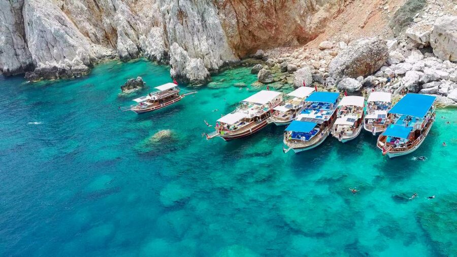 From Antalya or Kemer: Suluada Island Boat Trip with Lunch - Boarding a traditional boat in Adrasan