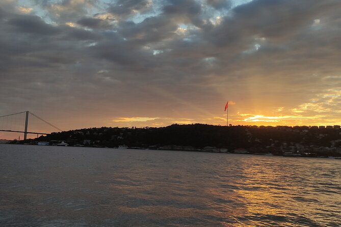 Istanbul Bosphorus Sunset Cruise with Wine on a Luxury Yacht - European shore: palaces, mosques, bridges, and fortifications