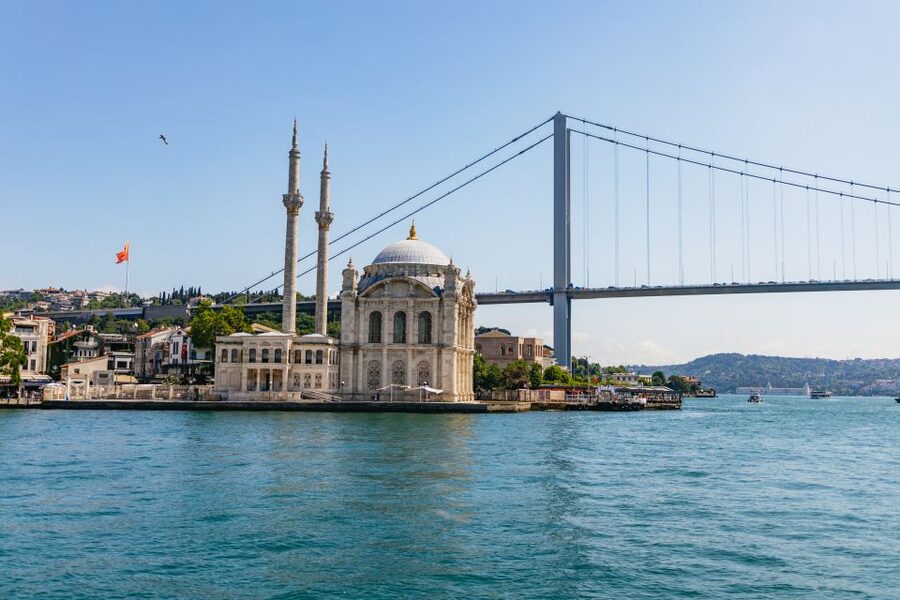 Istanbul: Bosphorus Yacht Cruise with Stopover on Asian Side - Under the Bosphorus Bridge toward Bebek