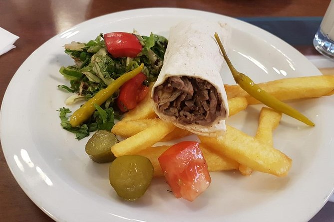 Istanbul Kadikoy Food Tour with 12+ Local Delicacies Tastings - Coffee, Wine, and Stories on Damacı Sokak