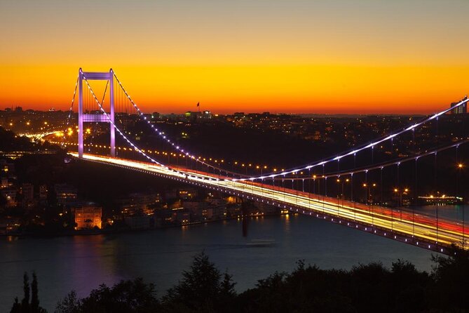 Istanbul Sunset Yacht Cruise on the Bosphorus with Transfers - Dolmabahçe and Çırağan Palace from the European shore