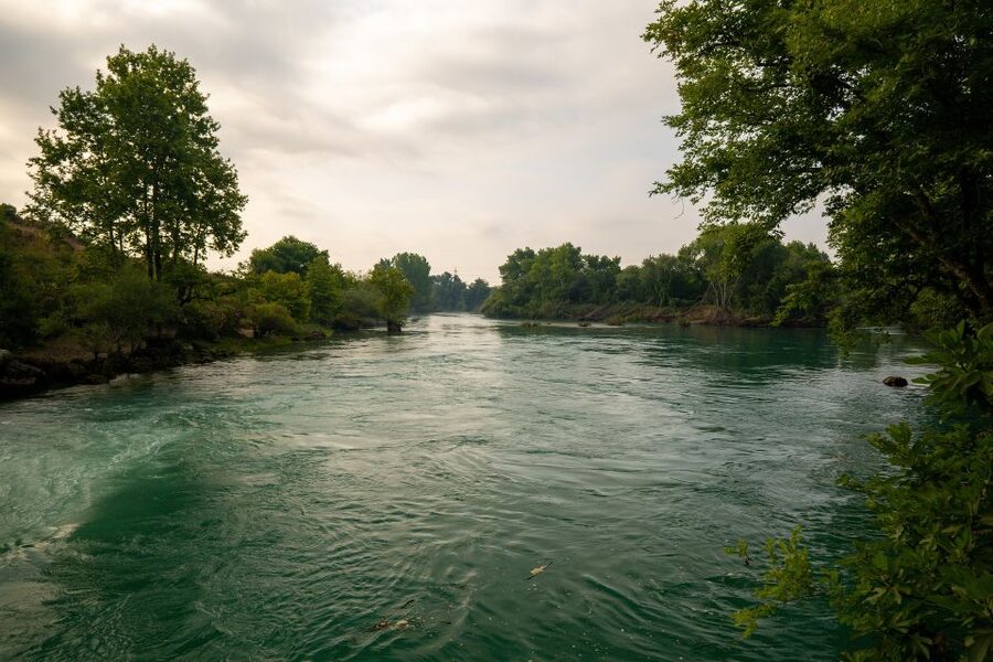 Manavgat River Cruise and Bazaar Tour w/ Lunch - Cruising the Manavgat River by wooden boat