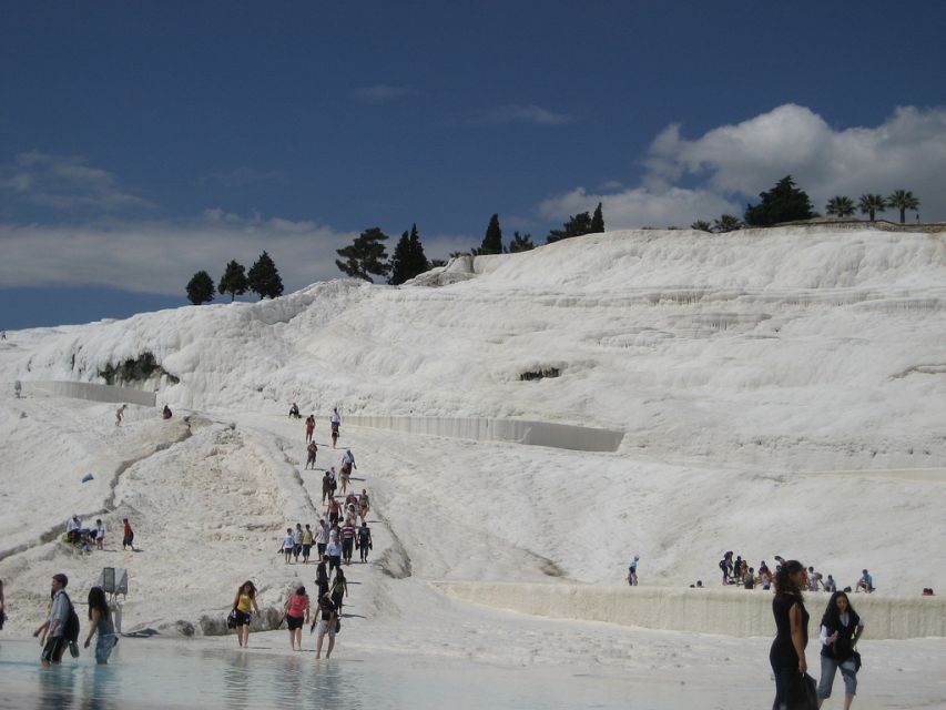 Marmaris: Pamukkale, Hot Spring, Travertines Tour with Lunch - Walking through Hierapolis above the springs