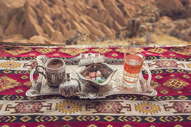 Sand-Brewed Turkish Coffee Workshop in Cappadocia - Grinding the beans and learning the coffee story