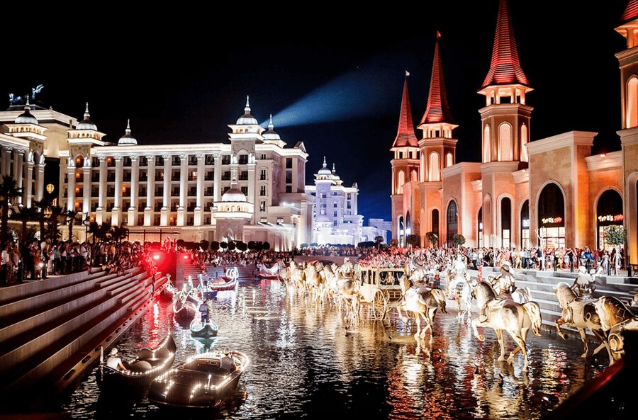 Side: Land of Legends Bus Transfers and Boat Parade - The musical boat parade is the evening anchor