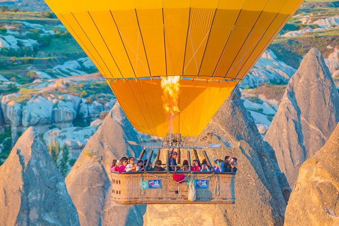 Sunrise Hot Air Balloon Flight Experience over Cappadocia - Weather, Cancellations, and Backup Planning